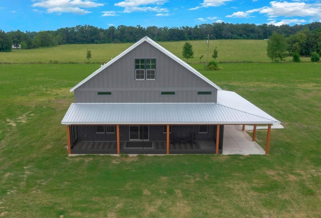 Drone aerial view of a custom built barndominium in Citra, FL