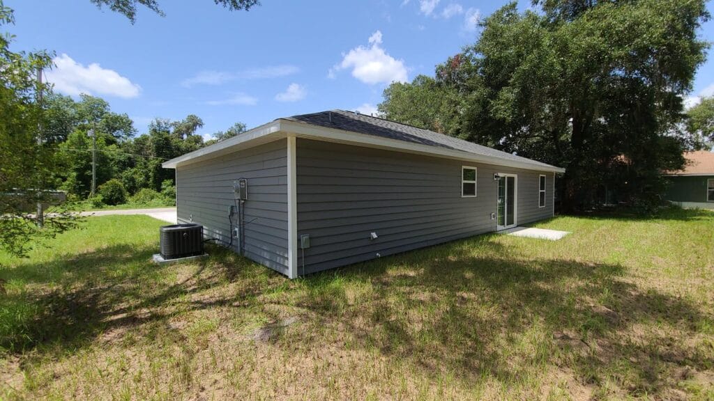 backyard view of a custom built spec house in Silver Springs Shores, FL