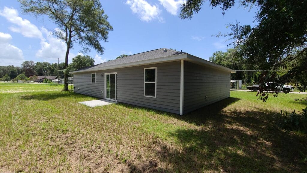 second backyard view of a custom built spec house in Silver Springs Shores, FL