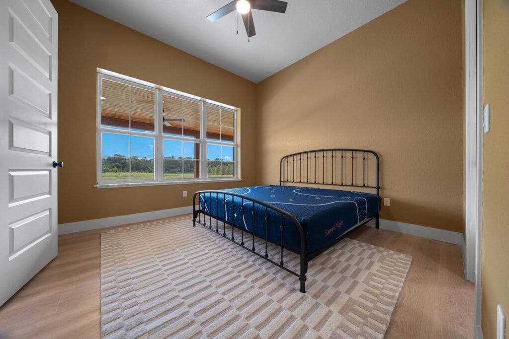 bedroom view of a custom built barndominium in Citra, FL