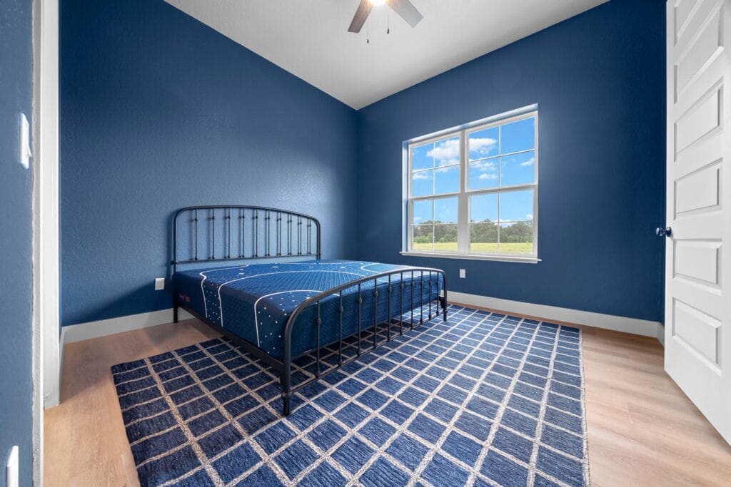 bedroom view of a custom built barndominium in Citra, FL
