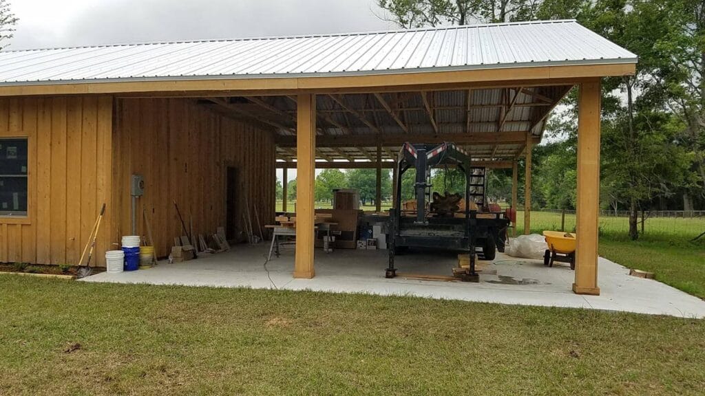 Garage view of a custom built cypress barndominium in Citra, FL